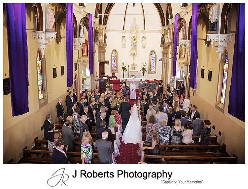 Bride walking to groom aerial view at Holy Name of Mary Hunters Hill - wedding photography sydney